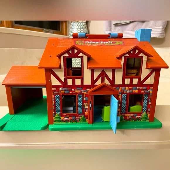 1980’s Fisher Price Little People Cottage Playhouse and People